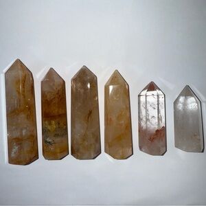 Six pieces, natural quartz towers
